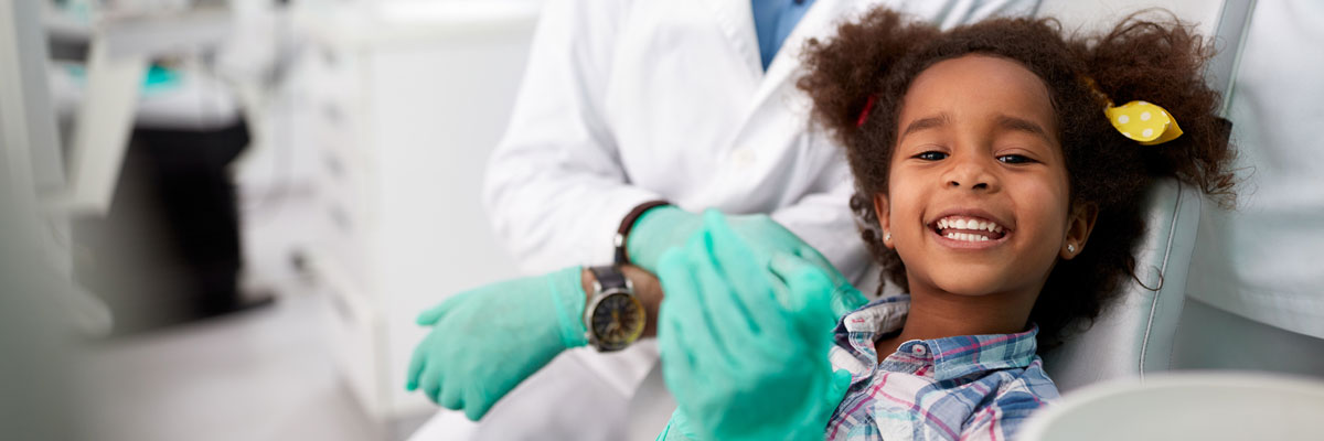 Young girl at the dentist