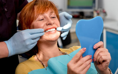 Senior woman in dentist's chair